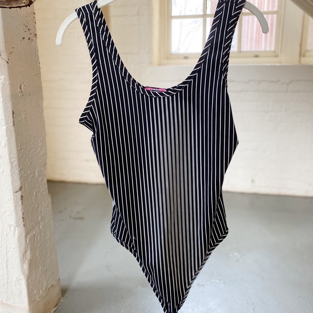 Black and white striped body suit